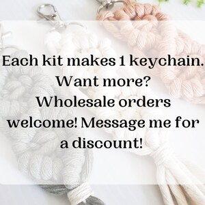 May include: Three macrame keychain kits in beige, gray, and light pink. Each kit makes one keychain. The text reads: "Each kit makes 1 keychain. Want more? Wholesale orders welcome! Message me for a discount!"