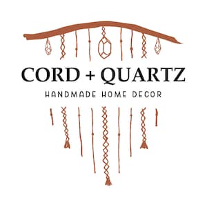 May include: A logo for a business called "CORD + QUARTZ" that specializes in handmade home decor. The logo features a stylized branch with hanging crystals and macrame.