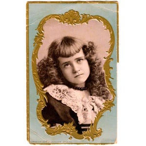 May include: Vintage portrait of a young person with curly hair, wearing a lace collar and a beaded necklace. The image is framed in a gold ornate border against a light blue background. The text "COPYRIGHT 1895 J.C. WOOLSON SPICE CO." is visible.