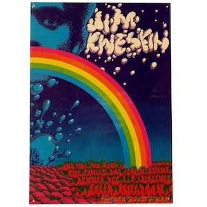 May include: Vintage poster with a psychedelic design. Features a vibrant rainbow arching across a dark blue sky, with the text "Jim Kweskin" in white bubble letters. The bottom of the poster has a field of red shapes.