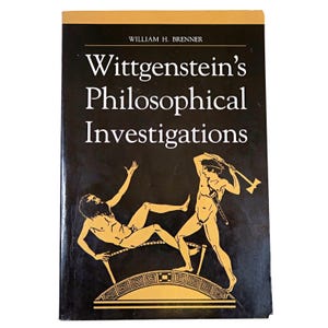 May include: A hardcover book titled "Wittgenstein's Philosophical Investigations" by William H. Brenner. The cover is black with gold lettering and illustrations of two figures. The book has a gold border.