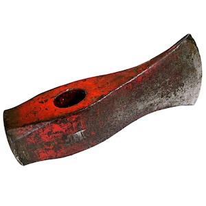 May include: A red and rusty splitting maul head with a worn appearance. The metal tool has a wedge-shaped blade and a hole for a handle. The head is painted red with visible wear and tear, suggesting frequent use.