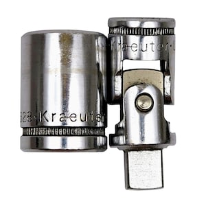 May include: Two silver Kraeuter brand socket wrenches. One is a standard socket, and the other is a universal joint socket. The text "328-Kraeuter" is visible on the standard socket. The universal joint socket is articulated.