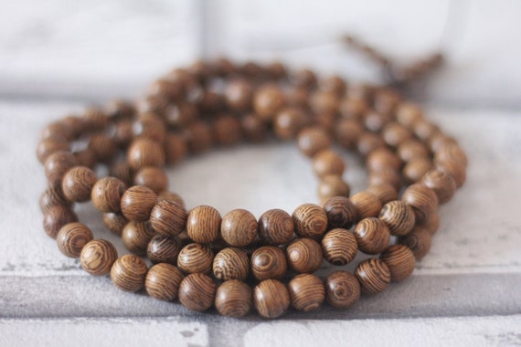 Wooden buddhist 2024 prayer beads