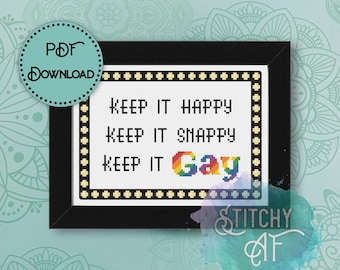 May include: A cross-stitch pattern with a black frame and white background. The pattern reads "Keep it happy, keep it snappy, keep it gay" with the word "gay" in rainbow colours.