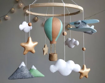 Travel nursery mobile. Adventure baby room decor. Baby boy girl crib mobile. Airplane, hot air balloon, mountain cot mobile. Musical mobile.