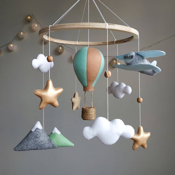 Travel nursery mobile. Adventure baby room decor. Baby boy girl crib mobile. Airplane, hot air balloon, mountain cot mobile. Musical mobile.