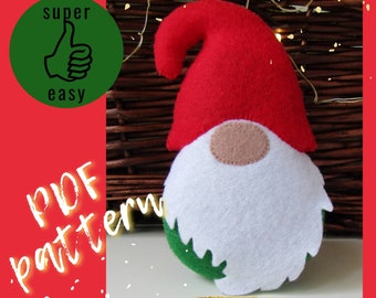 May include: A PDF pattern for a felt gnome with a red hat, white beard, and green foliage. The pattern includes step-by-step instructions.  The text "PDF pattern" and "super easy" are visible in the image.