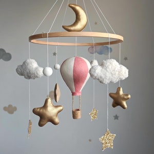 Hot air balloon baby mobile. Hot air balloon nursery decor. Crib mobile with Wicker balloon, boucle clouds. Travel theme, adventure nursery.