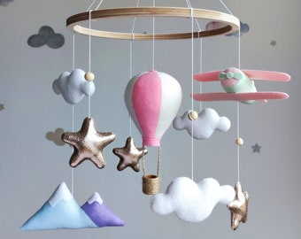 Travel nursery mobile. Adventure baby room decor. Baby girl crib mobile. Airplane, pink hot air balloon, mountain cot mobile. Musical mobile