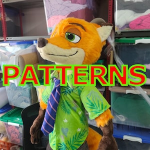 May include: A plush fox character head and torso featuring orange fur, green eyes, and a cream-colored muzzle. The character wears a short-sleeved lime green button-down shirt with a tropical leaf pattern and a purple necktie with diagonal stripes.