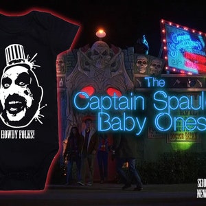 May include: Black baby onesie with a white graphic of Captain Spaulding from the movie House of 1000 Corpses. The text "Howdy Folks!" is printed below the graphic. The onesie is shown in front of a neon sign that reads "Captain Spaulding's  House of 1000 Corpses".
