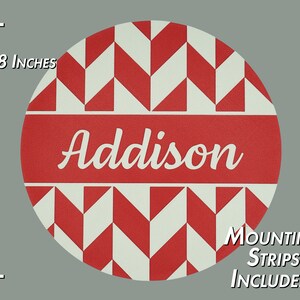 May include: 8-inch round wooden sign with a red and white chevron pattern. The sign has the name "Addison" in white text on a red band. Mounting strips are included.