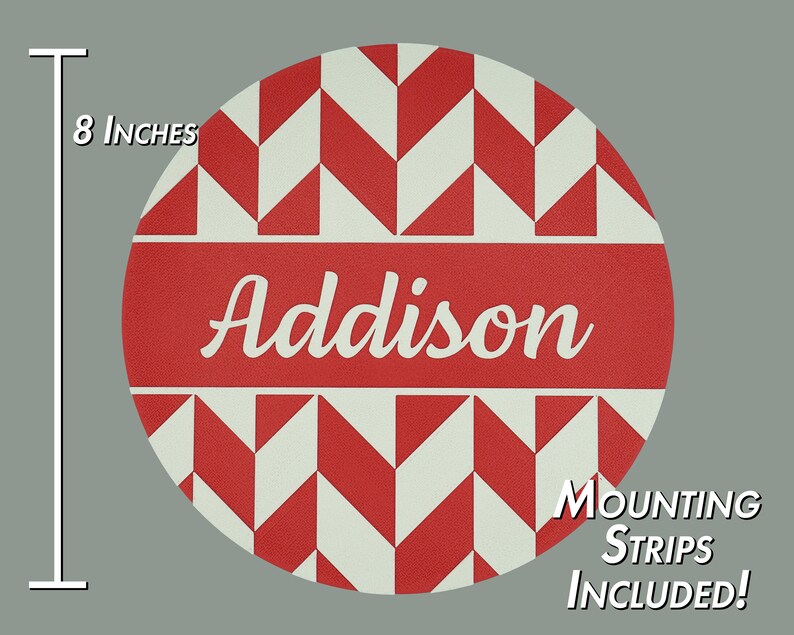 May include: 8-inch round wooden sign with a red and white chevron pattern. The sign has the name "Addison" in white text on a red band. Mounting strips are included.