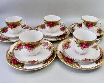 Set di tazze da tè e piattini in porcellana vintage Royal Winterling Marktleuthen Bavaria con rose rosa e arancioni, finitura placcata oro