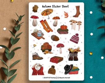 May include: A sheet of autumn-themed stickers featuring illustrations of mushrooms, leaves, boots, hats, coffee mugs, and other fall-inspired designs. The sticker sheet is white with black text that reads "Autumn Sticker Sheet".