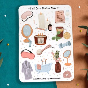 May include: A sticker sheet with illustrations of self-care items, including a sleep mask, candles, a bath, a glass of water, a book, a teacup, a dumbbell, a bathrobe, a face mask, a face brush, a mirror, and flowers. The sheet is white with a light blue border and the text "Self Care Sticker Sheet" at the top.