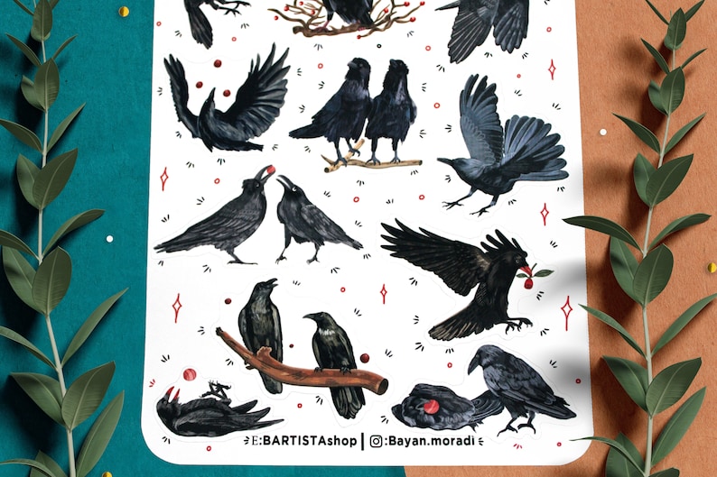 May include: A sheet of stickers featuring black crows in various poses, some with red berries. The stickers are on a white background with red and white stars. The text "E:BARTISTA shop | @Bayan.moradi" is at the bottom of the sheet.