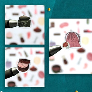May include: Three stickers featuring beauty products. The first sticker shows a jar of face mask with the text "FACE MASK". The second sticker shows a pink drawstring bag with a small jar of face cream inside. The third sticker shows a small jar of face cream with a pink lid.
