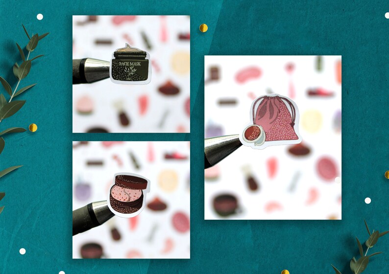 May include: Three stickers featuring beauty products. The first sticker shows a jar of face mask with the text "FACE MASK". The second sticker shows a pink drawstring bag with a small jar of face cream inside. The third sticker shows a small jar of face cream with a pink lid.