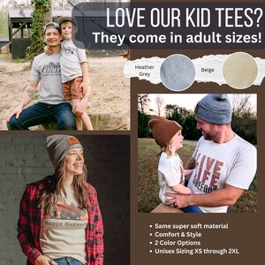 May include: Image features a promotional display for matching adult and kid's apparel. The image includes people wearing heather grey and beige t-shirts and beanies. The text reads "LOVE OUR KID TEES? They come in adult sizes!" and "Happy Harvest."