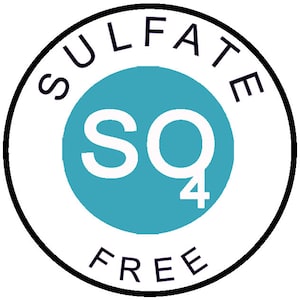 May include: A white circle with a black border and the text "SULFATE FREE" around the edge. Inside the circle is a teal blue circle with the text "SO4" in white.