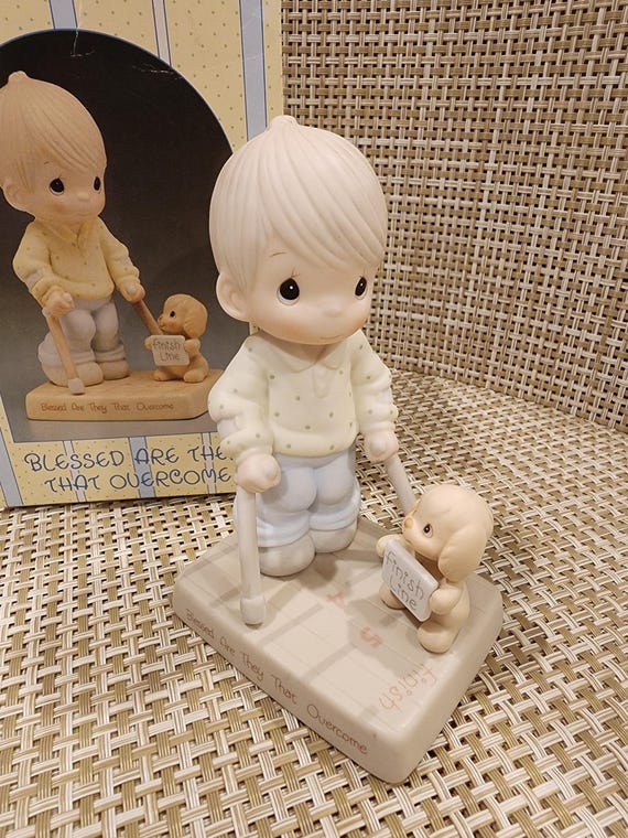 Vintage Precious Moments Figurine “Blessed Are They That Overcome" with box (IOB) (Retired-Easter Seals)