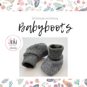 Könnte beinhalten: Ein Paar graue Baby-Booties mit einem umgeschlagenen Bündchen. Die Booties sind aus weichem, gestricktem Stoff. Das Bild enthält den Text "Schnittmuster und Anleitung Babyboots inki ebooks".