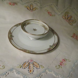 Hand painted two tier serving plate with attached dish