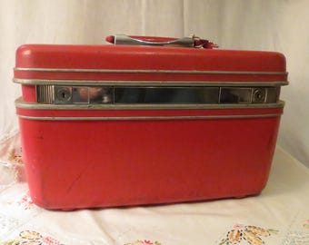 Vintage Samsonite red makeup case or overnight suitcase