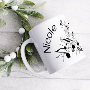 Personalisierte Musiker-Tasse. Kaffeetasse mit Noten, Klarinette und mit Namen. Prima als Geschenk für Klarinettistinnen und Klarinettisten.