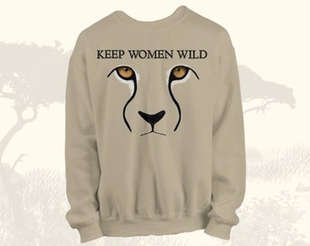 May include: Tan sweatshirt with a cheetah face graphic and the text "KEEP WOMEN WILD" printed on the front.