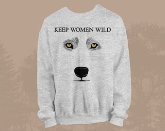 May include: Gray sweatshirt with the text "KEEP WOMEN WILD" and a wolf's face with yellow eyes and a black nose.