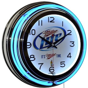 May include: A round wall clock with a white face featuring the Miller Lite logo and the text "IT'S Miller TIME." The clock has a black bezel, a chrome-colored outer ring, and a bright blue neon light. The clock hands are black.