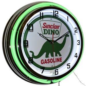 May include: A round neon clock with a green neon border and a white inner ring. The clock face features the Sinclair Oil logo with a green dinosaur and the word "GASOLINE". The clock has black hands and numbers.