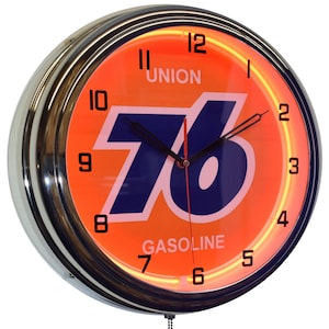 May include: A round, orange and blue neon clock with the number 76 and the words "UNION GASOLINE" on the face. The clock has a silver metal frame.