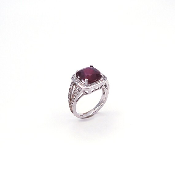 18 K Diamond and Ruby Cushion Cut White Gold Ring in a One Row Halo and Split Shank