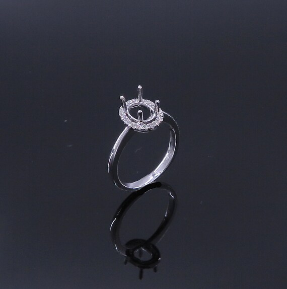 14 K W Gold Solitaire w/ a Diamond Halo Semi-Mount Ring, Gold, 2.8 grams, TW of diamonds, 0.23 CT
