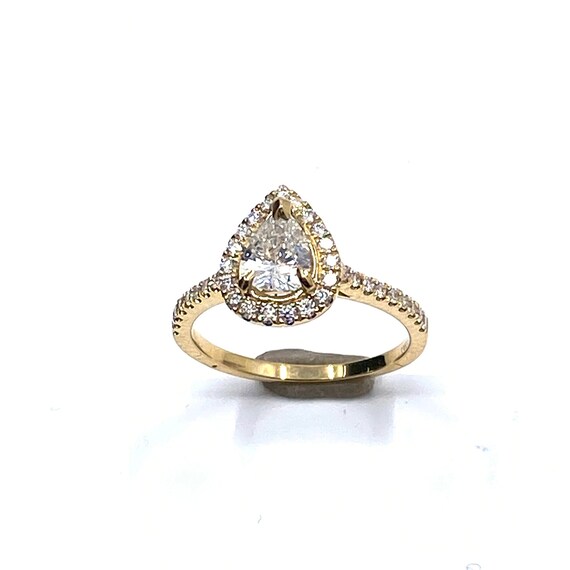 14 K Y Pear Shape Center Diamond Featuring One Row Halo, Gold, 2.45 grams, TW of diamonds, 0.96 CT