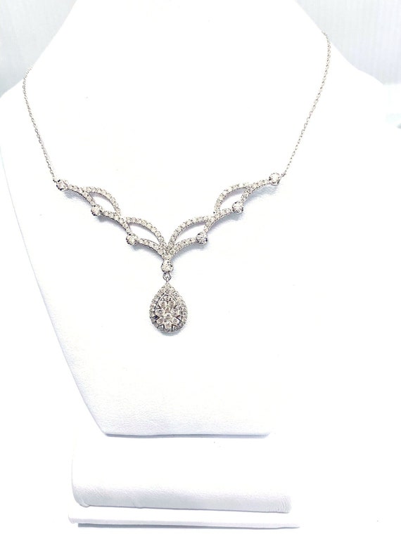18 K W Gold Diamond Necklace w/ Dangling Pear Shape Pendant Surrounded, Gold, 4.56 grams, TW of diamonds, 0.54 CT