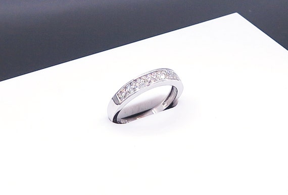 14 K White Gold Diamond Band / Ring in Two Rows of Shared Prong in a One Row Chanel Set