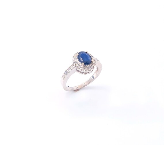 14 K White Gold Diamond Oval Shape Sapphire on One Row Halo Ring with Miligri Edges