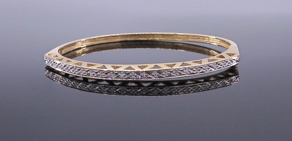 Elegant 14 K Fancy Yellow Gold Diamond Bangle Bracelet featuring Side Galleria