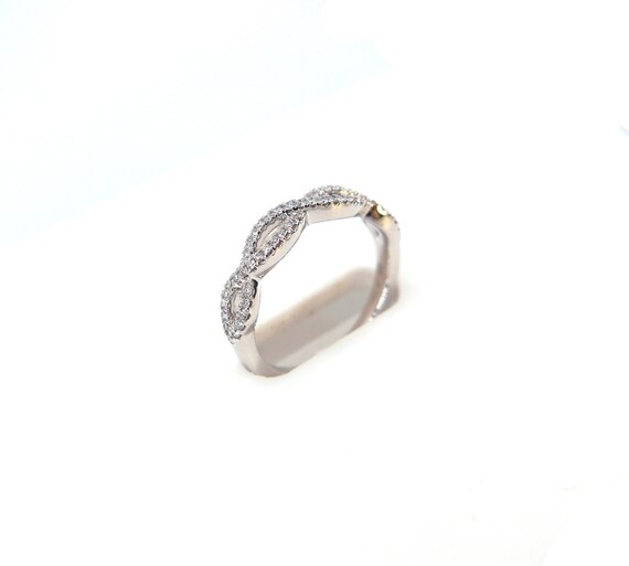 14 K W Gold Diamond Wave Band, Gold, 3.1 grams, TW of diamonds, 0.22 CT