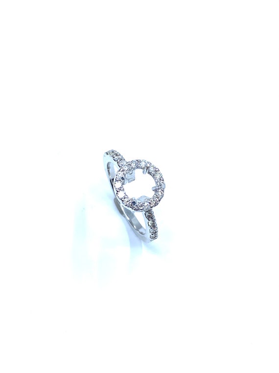 18 K W Gold Diamond Engagement Ring Semi-mount w/ 4 Prongs built on a Raised Round Halo, Gold, 3.8 grams, TW of diamonds, 0.74 CT