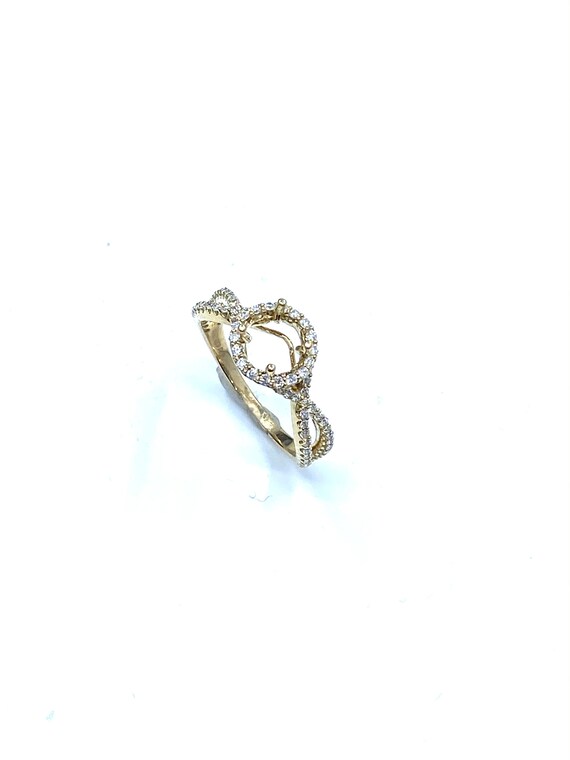 14 K Yellow Gold Diamond Semi-mount Designer Engagement Ring with Built in Four Prongs on a Round Halo