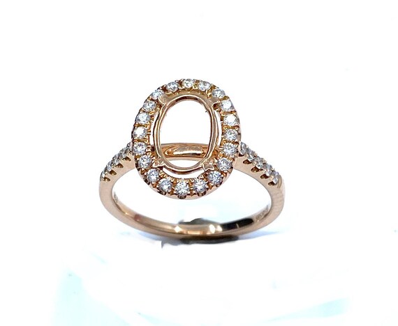 14 K Rose Gold Diamond Oval Shape With Prong Set