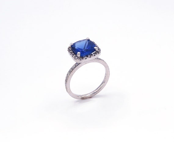 14 K W Gold Diamond and Tanzanite Cushion Shape One Row Halo Diamond Ring, Gold, 4.5 grams, TW of Diamonds, 0.81 CT