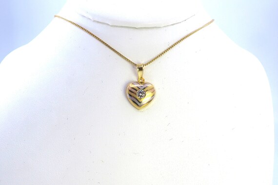 14 K Yellow Gold Heart Shaped Slider Pendant Featuring Back Gallery and Bezel Set, Gold, 2.1 grams, TW of diamonds, 0.44 CT