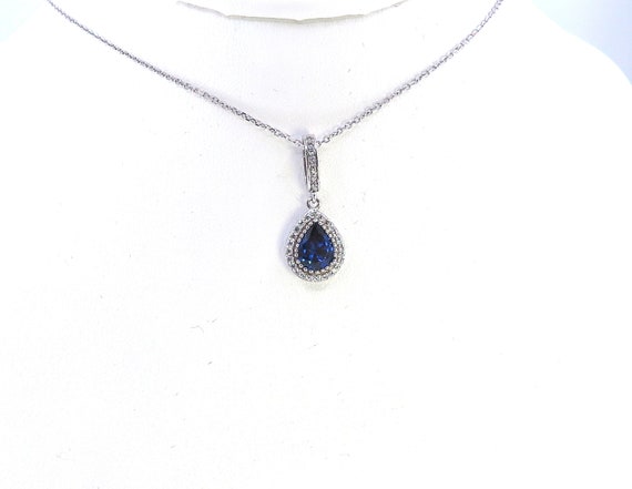 14 K White Gold Pear Shaped Classic Sapphire Slider Pendant featuring Oval Shaped Bale w/ Chain, Gold, 4.2 grams, TW of diamonds, 0.43 CT